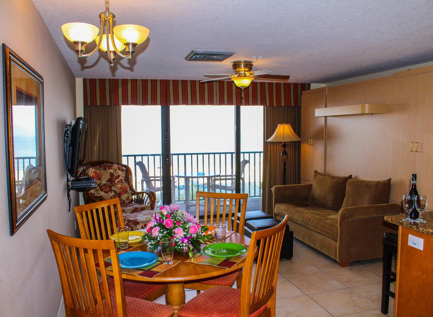 A cozy living and dining area at VRI's Island Gulf Resort in Madeira Beach, Florida.